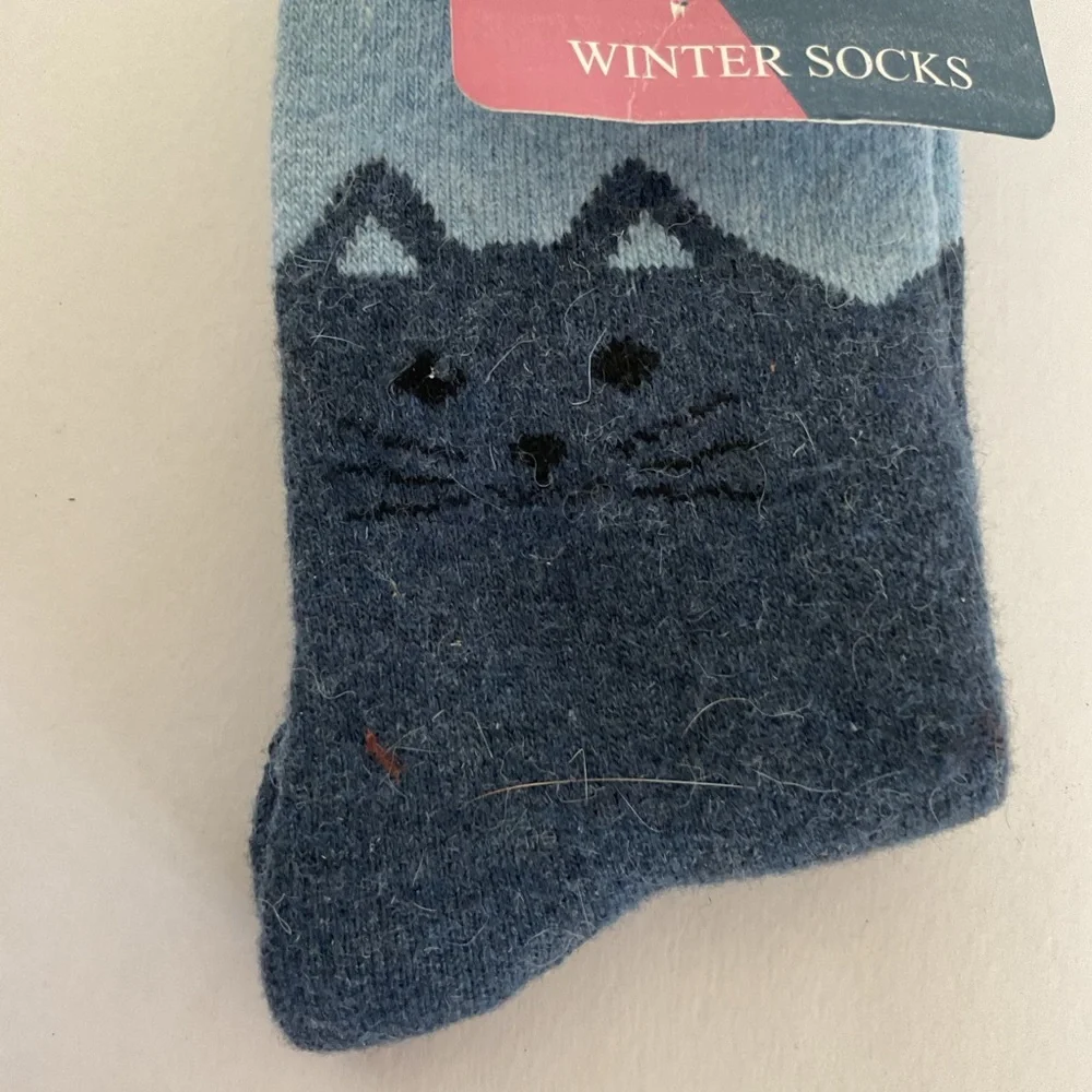 Wool socks with cat graphics. NWT